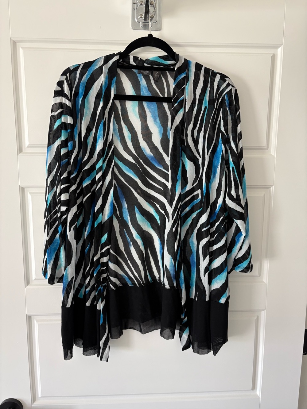 Chico's Travelers mesh cardigan with black, white, and blue zebra print.  Size 3
